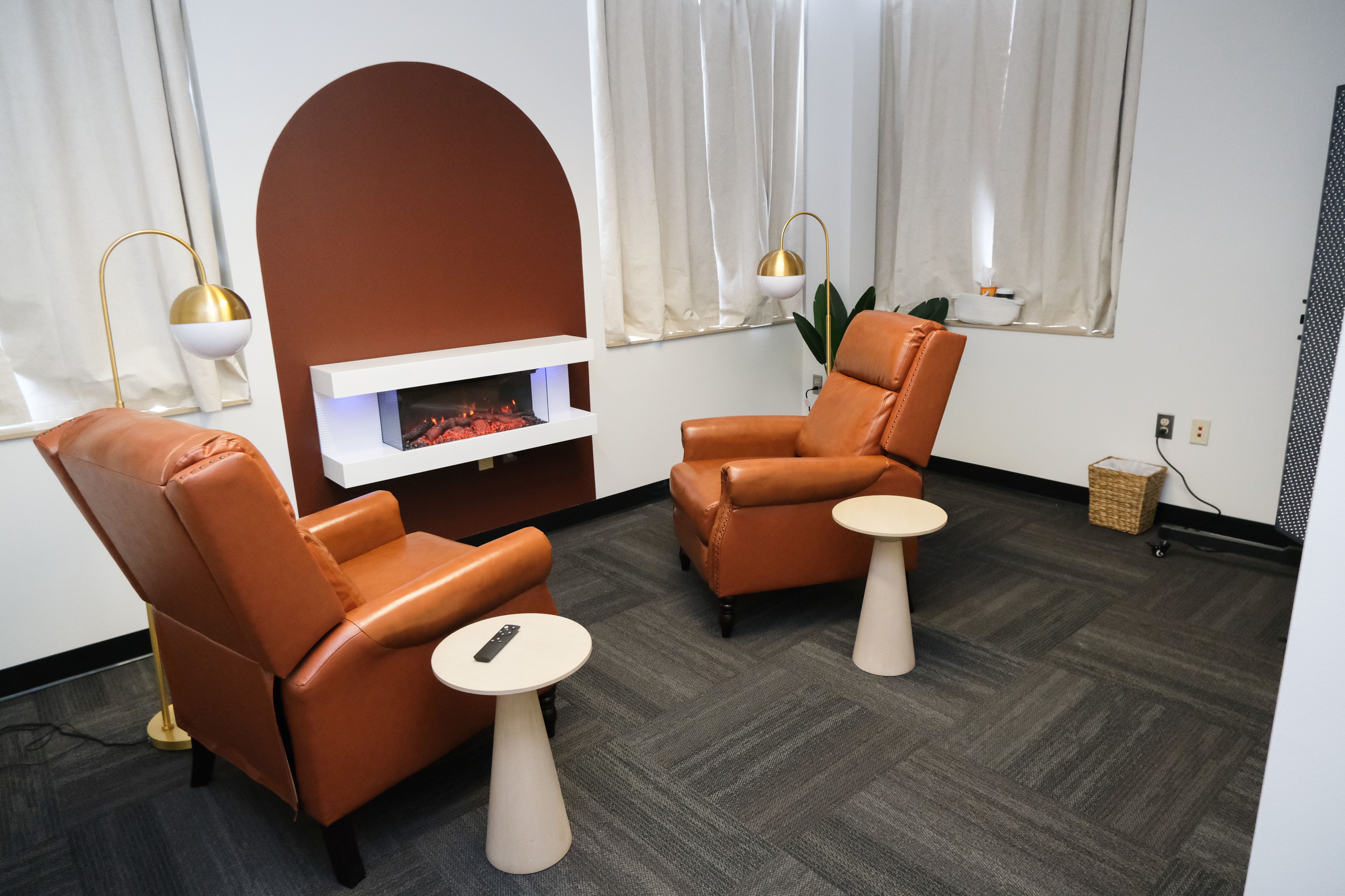 Client relaxing in the red light therapy room at Body by Choice Training, Grand Rapids